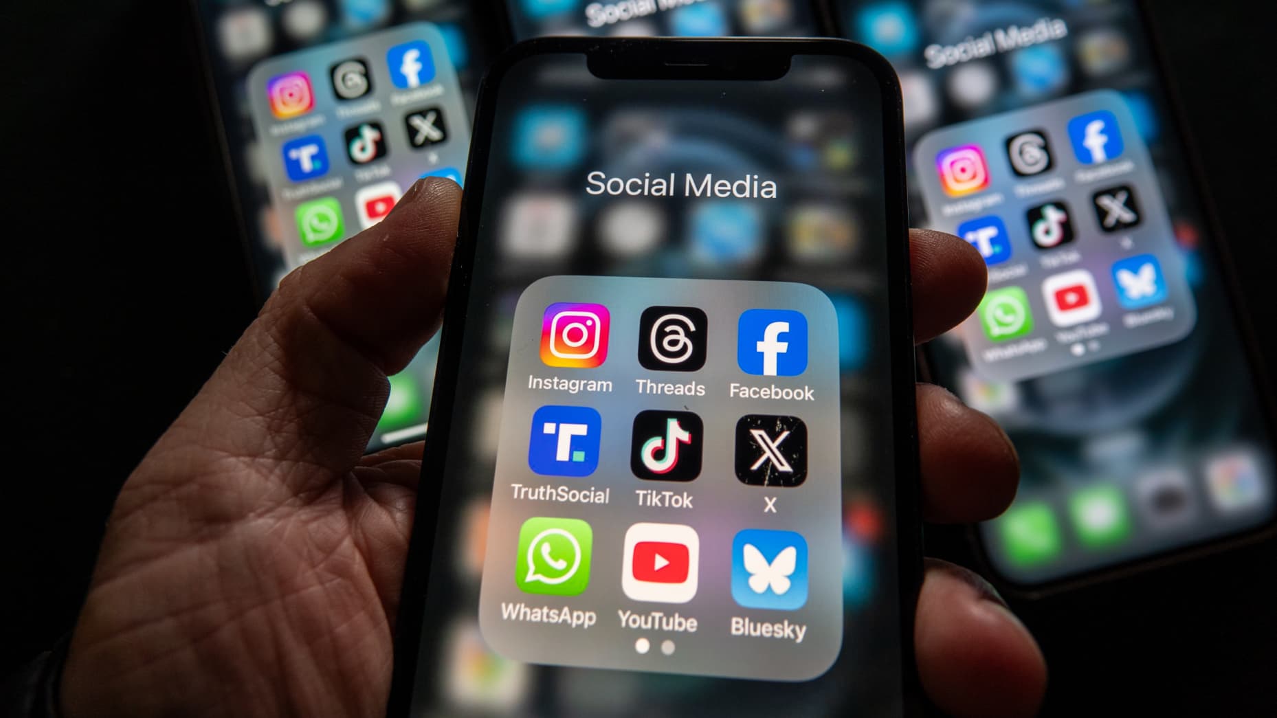 BATH, UNITED KINGDOM - FEBRUARY 09: In this photo illustration, iPhone screens display various social media apps on the screens on February 9, 2025 in Bath, England. On top row left to right, the logo of social media platform Instagram is seen beside that of Meta’s Threads and Facebook. On the middle row from left is the logo of Donald Trump's Truth Social app, next to the logo of social media app TikTok and the logo of Elon Musk’s US online social media and social networking site 'X' (formerly known as