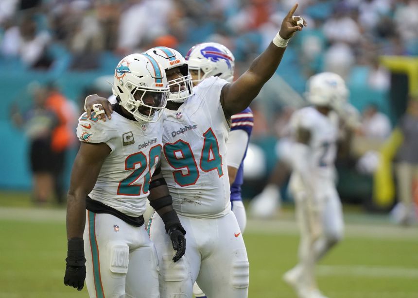 Miami Dolphins linebacker Jordyn Brooks and defensive tackle Jordan Phillips during the team's 30-13 win over the Buffalo Bills.