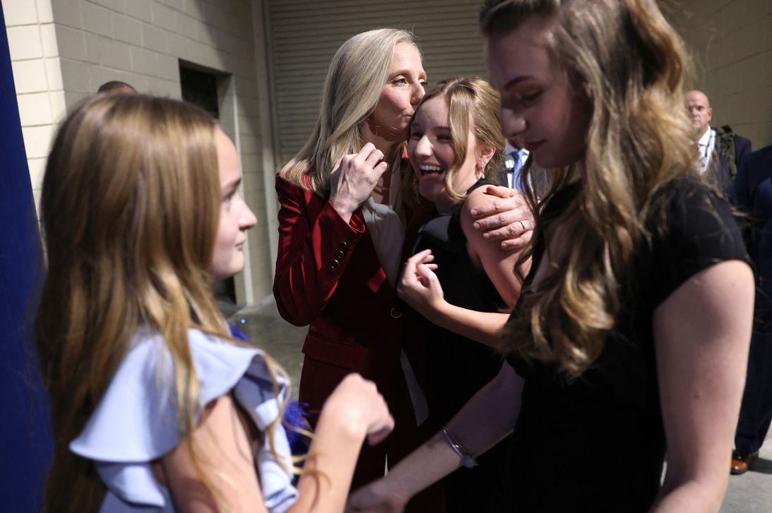 Virginia gubernatorial candidate, former Rep. Abigail Spanberger celebrates with her daughters as she arrives for her election night rally in Richmond, Virginia, on Tuesday.
