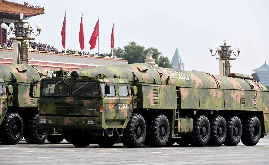 Military vehicles transport DF-26D ballistic missiles during the Victory Day military parade in Beijing, China, on September 3.