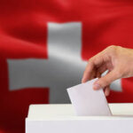 Why is the Swiss government opposing stricter neutrality rules?